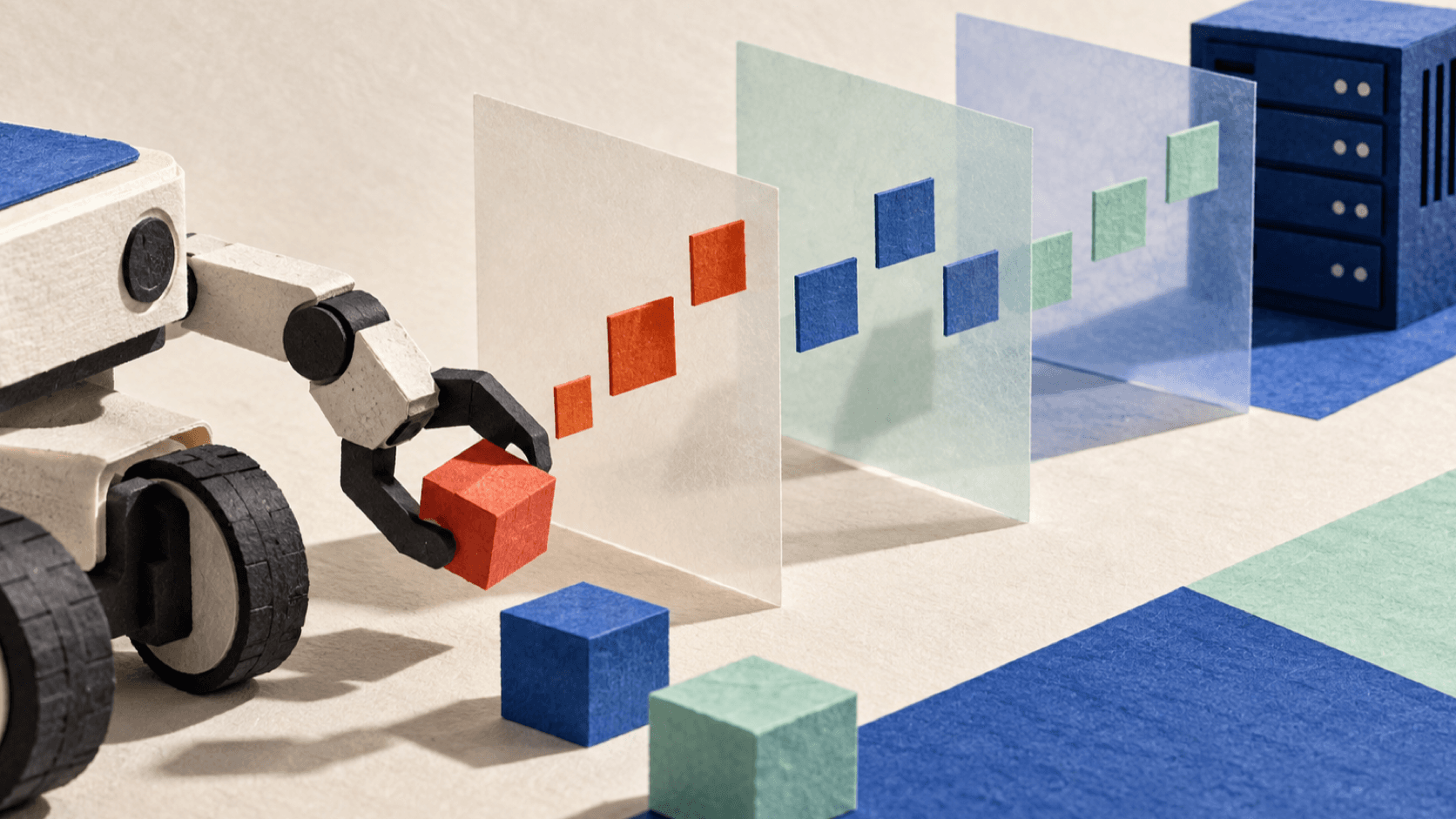 Paper sculpture of a mobile robot moving colored blocks through translucent layers toward a remote server